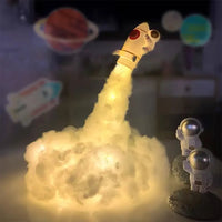 Încărcați imaginea în vizualizatorul Galeriei, Lampă Rachetă 3D cu Astronaut și Nori Colorati LED – Veioză de Noapte USB
