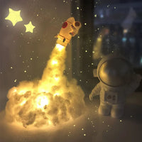 Încărcați imaginea în vizualizatorul Galeriei, Lampă Rachetă 3D cu Astronaut și Nori Colorati LED – Veioză de Noapte USB
