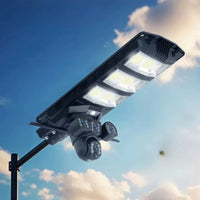 Încărcați imaginea în vizualizatorul Galeriei, Lampa Solara cu Camera Supraveghere 450W, IP65, Detectie Miscare, Panou Solar Integrat, Monitorizare 24/7, Control Telefon, Rotatie 360°
